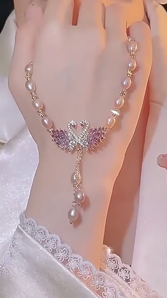 "Eternal Elegance" Pearl and Swan Hand Bracelet